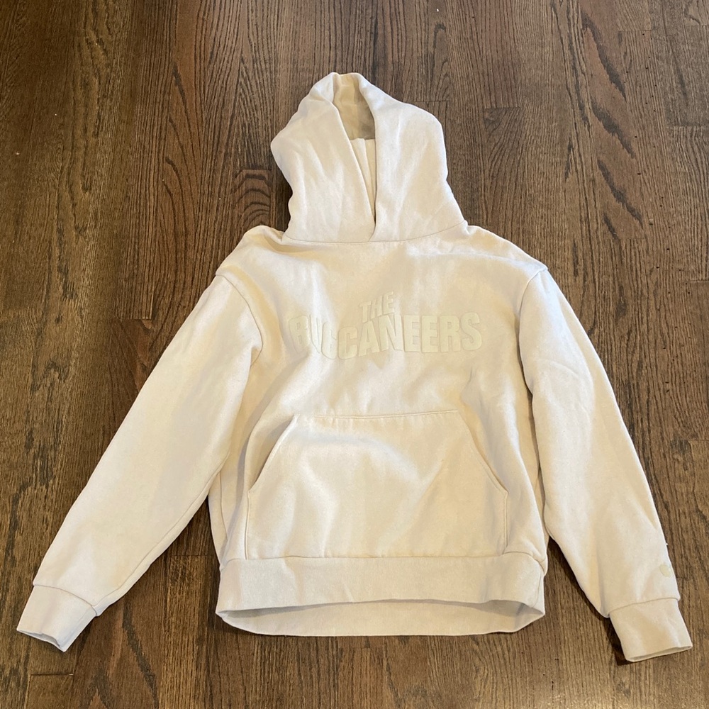 The Buccaneers TV Show Logo on Front of Cream Hoodie with Front Pocket